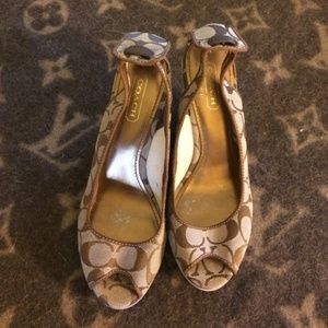 Tan and brown Coach wedges